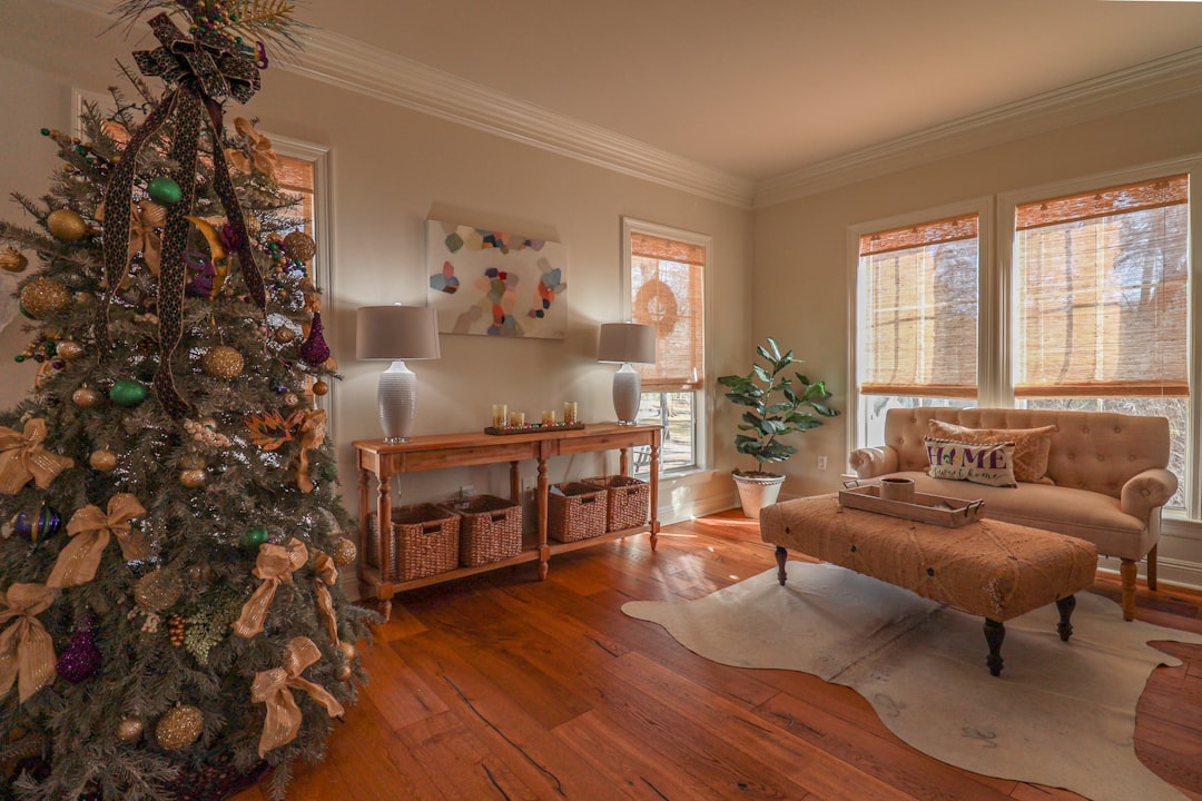 founder-img a-decorated-christmas-tree-in-a-cozy-living-room-tu0yhhnimss